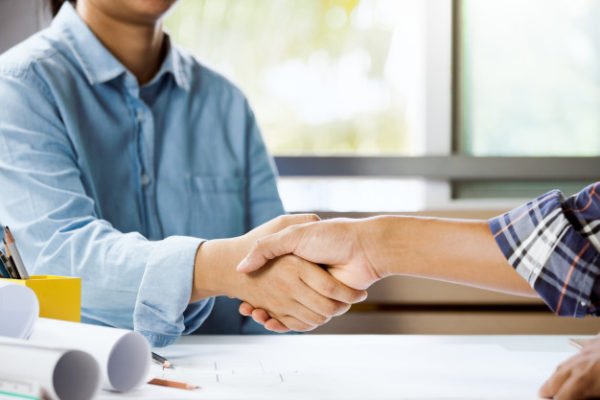 architect-engineer-shaking-hand-office-concept-building-team-working-project-cooperation_6216-20